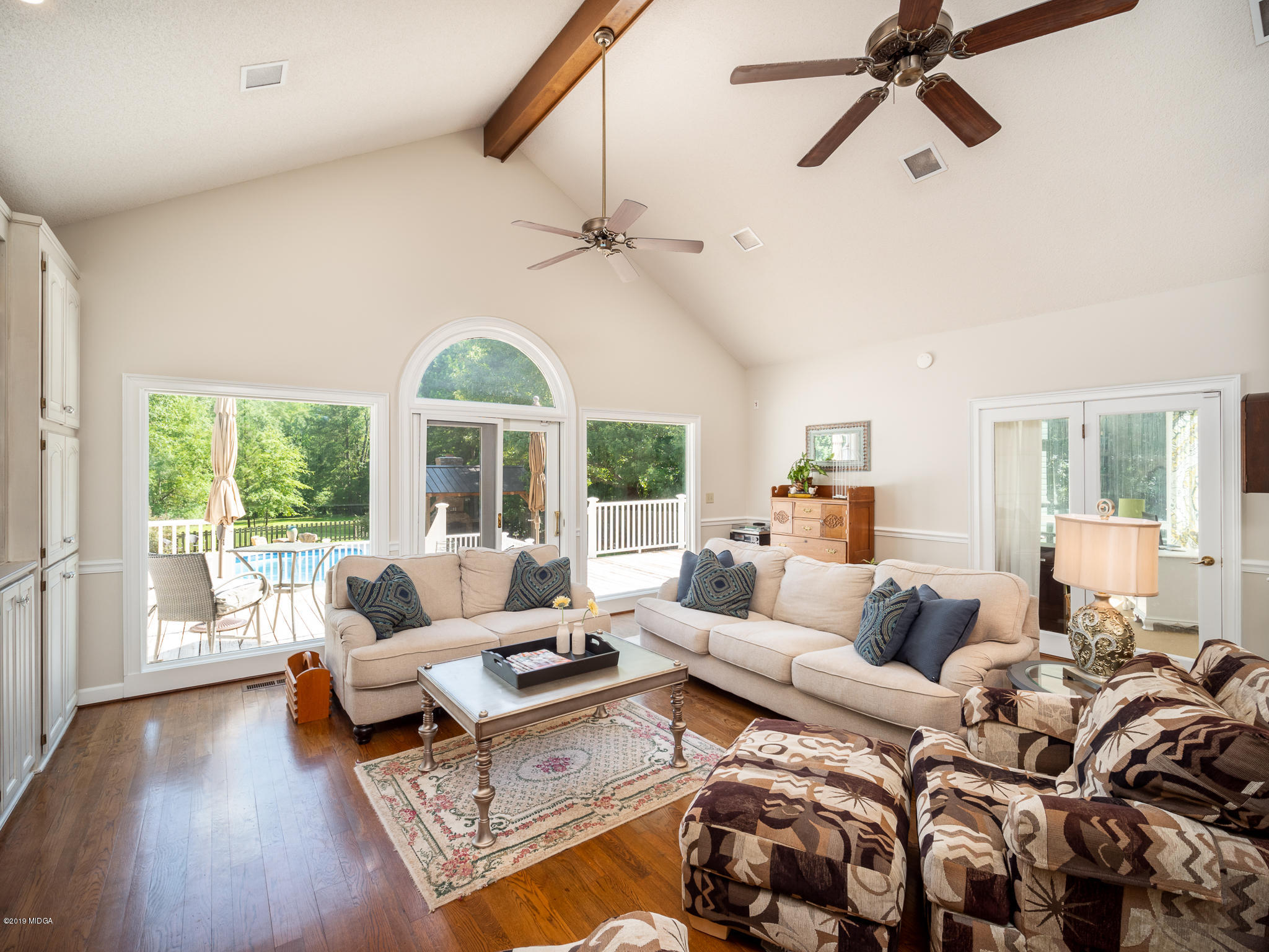 241 Country Creek Road Macon, GA 31220 - Photo 15 of 26 a living room with furniture and a large window
