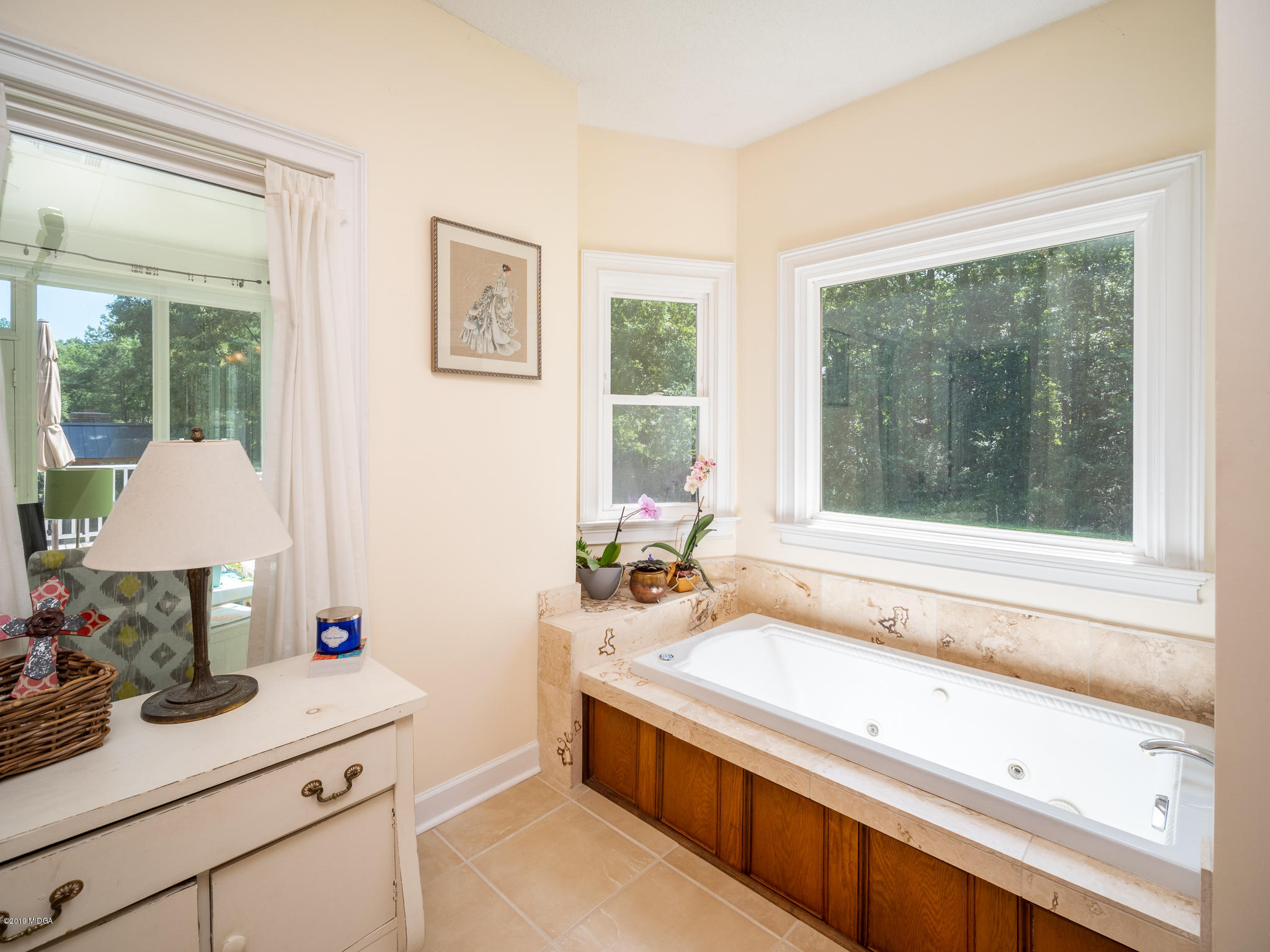241 Country Creek Road Macon, GA 31220 - Photo 23 of 26 a bathroom with a sink and a large window