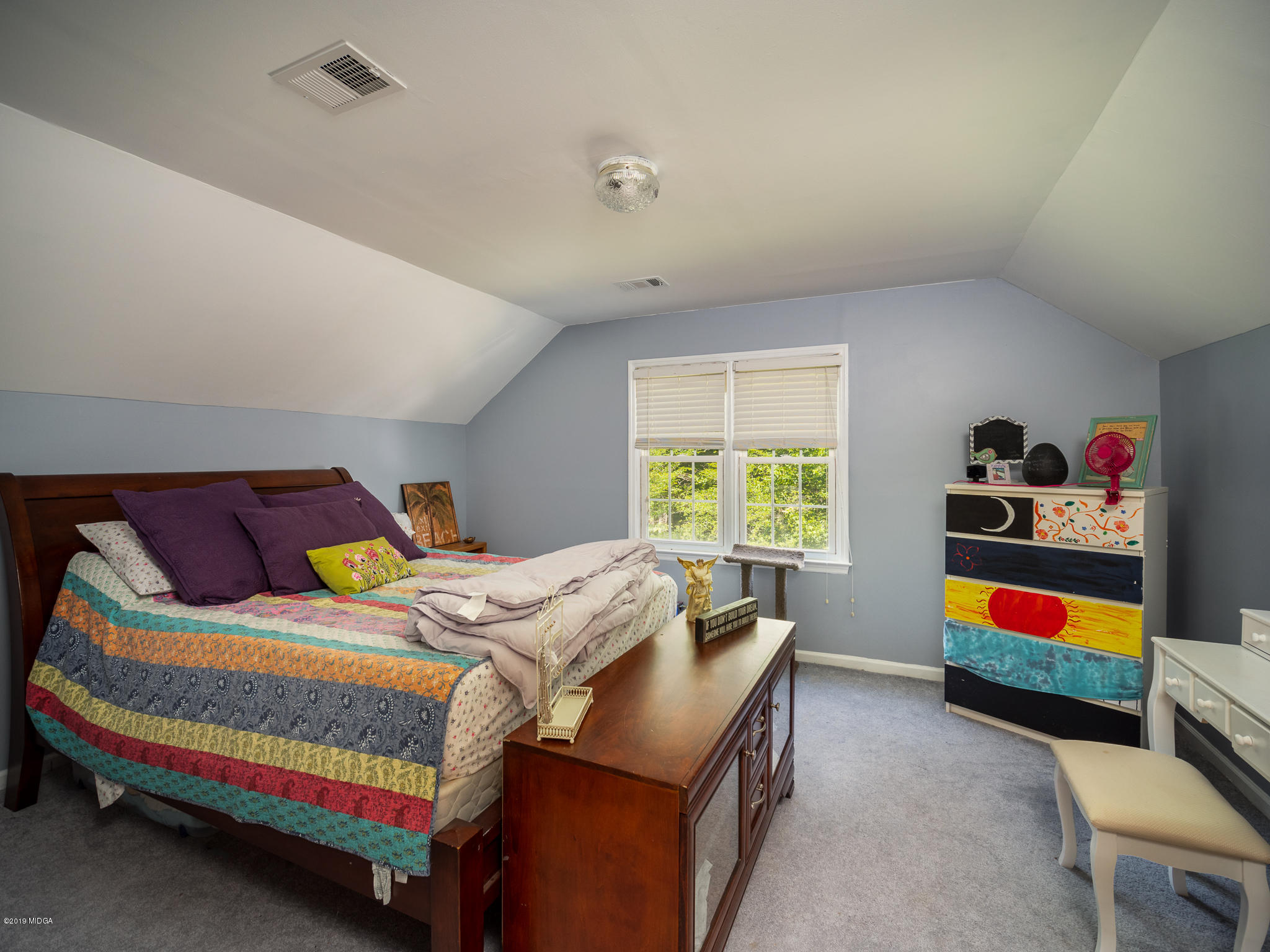 241 Country Creek Road Macon, GA 31220 - Photo 26 of 26 a bedroom with a bed and window
