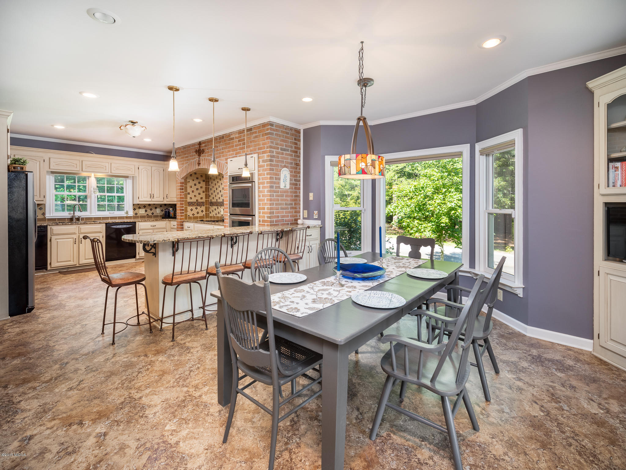 241 Country Creek Road Macon, GA 31220 - Photo 6 of 26 a view of a dining room with furniture window and outside view
