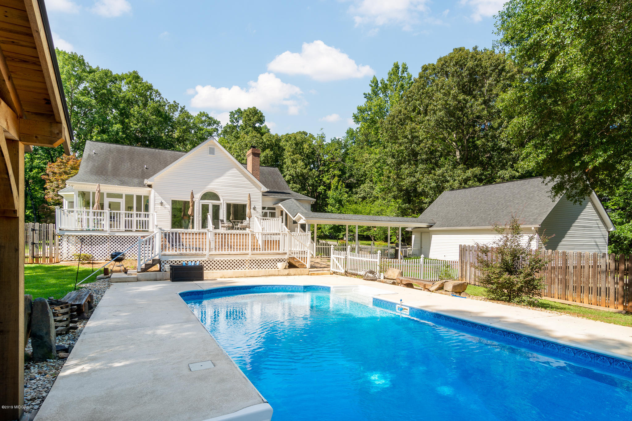 241 Country Creek Road Macon, GA 31220 - Photo 10 of 26 an aerial view of a house with swimming pool garden and patio