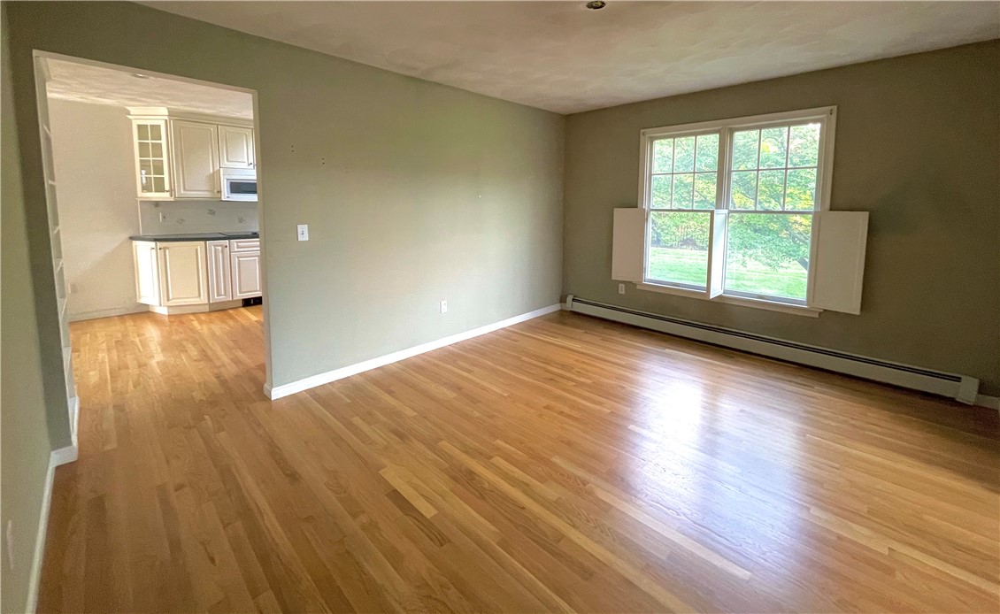 15 Jacobs Point Road Warren, RI 02885 - Photo 17 of 44 Formal dining room off the kitchen and between the Living Room