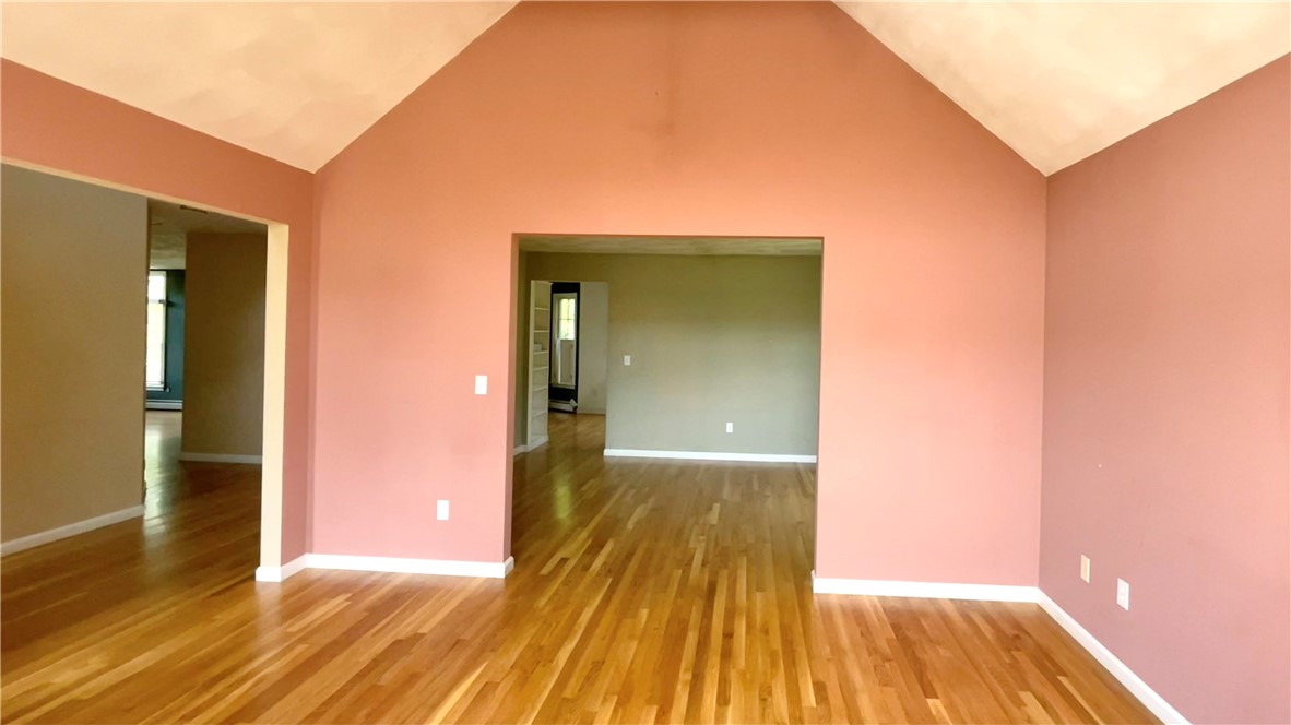 15 Jacobs Point Road Warren, RI 02885 - Photo 20 of 44 View is looking from living room into formal dining room hallway to left