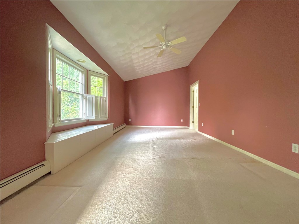 15 Jacobs Point Road Warren, RI 02885 - Photo 23 of 44 Spacious front to back master suitew/custom walk in closet, large window seat, corner jacuzzi tub, walk in shower and double sinks.