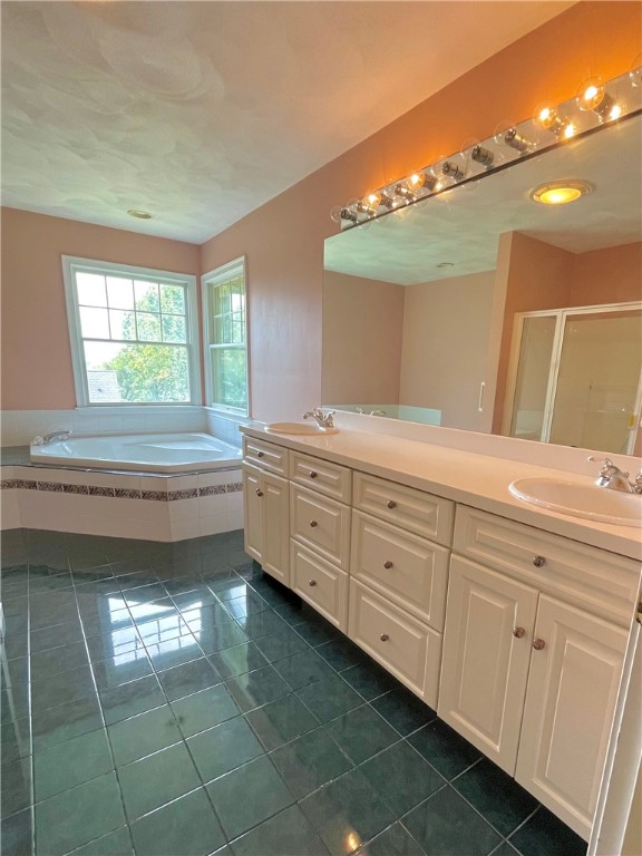 15 Jacobs Point Road Warren, RI 02885 - Photo 24 of 44 White Vanity dbl sinks, corner Jacuzzi w/ large windows that offers winter water views over Narr Bay