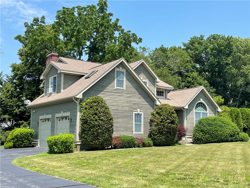 15 Jacobs Point Road Warren, RI 02885 - Photo 3 of 44 Wonderful 1/2 acre lot that is lined with pretty flowering trees.