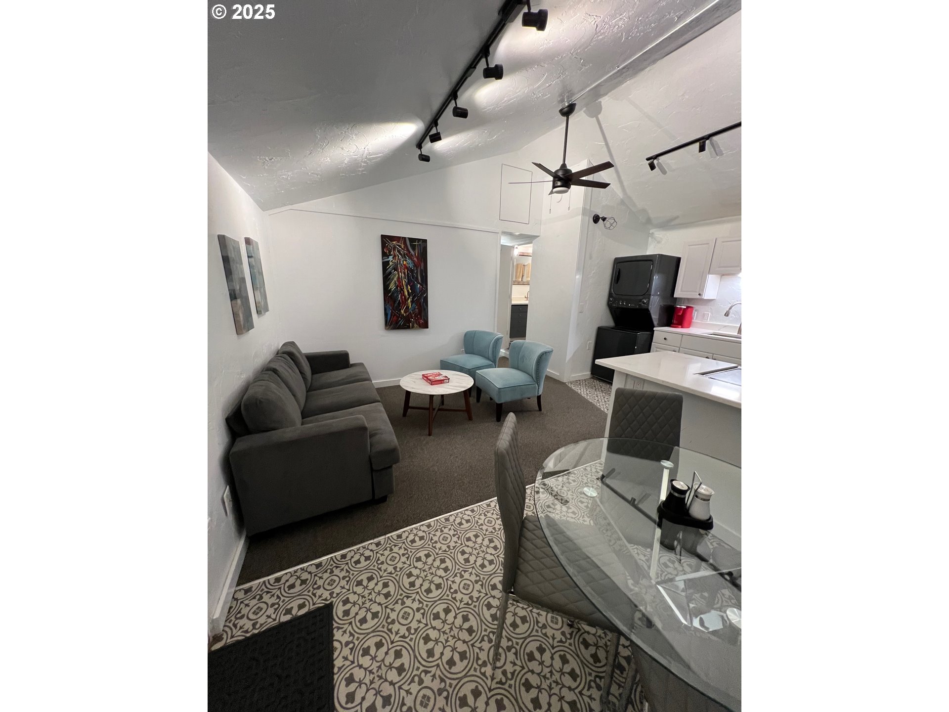 734 East 14th Avenue Eugene, OR 97401 - Photo 12 of 27 a living room with furniture and a flat screen tv