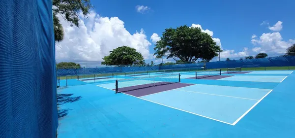 a view of a patio with swimming pool