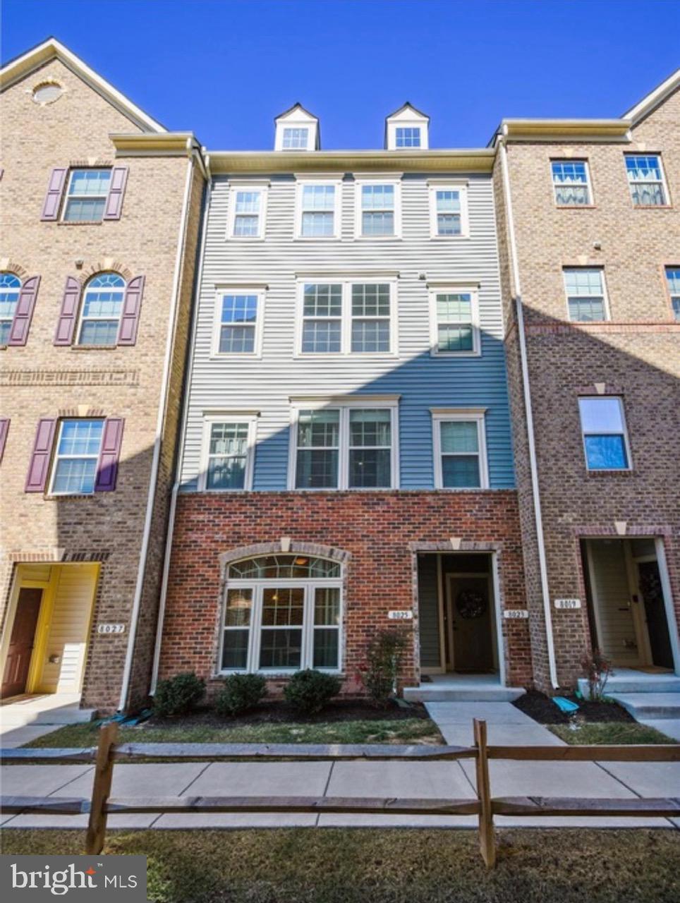 a front view of a multi story residential apartment building