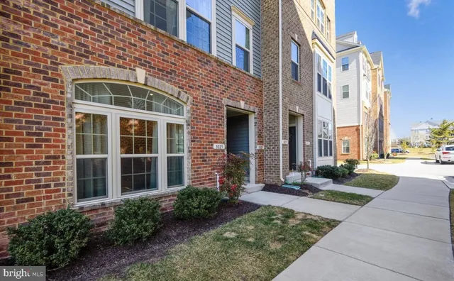 a view of a building with a yard