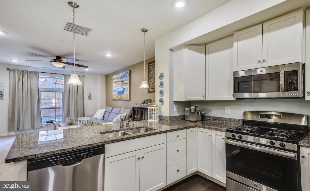 8025 Orchard Grove Road Odenton, MD 21113 - Photo 9 of 23 Please note kitchen flooring has been updated.