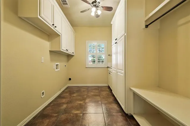a house view with a sitting space and garden