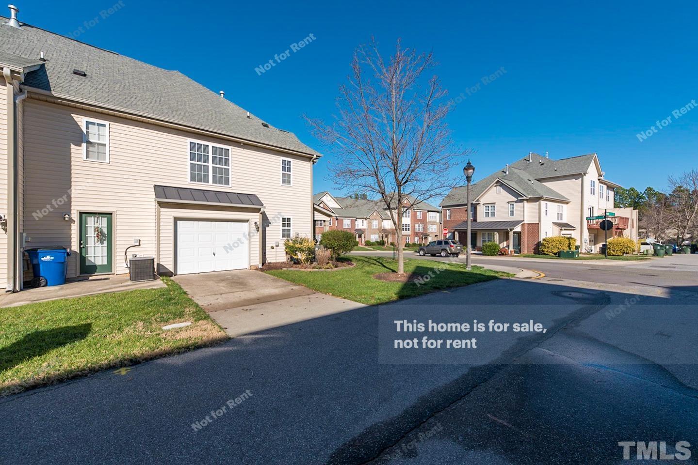 9801 Layla Avenue Raleigh, NC 27617 - Photo 17 of 17 a view of street with big building
