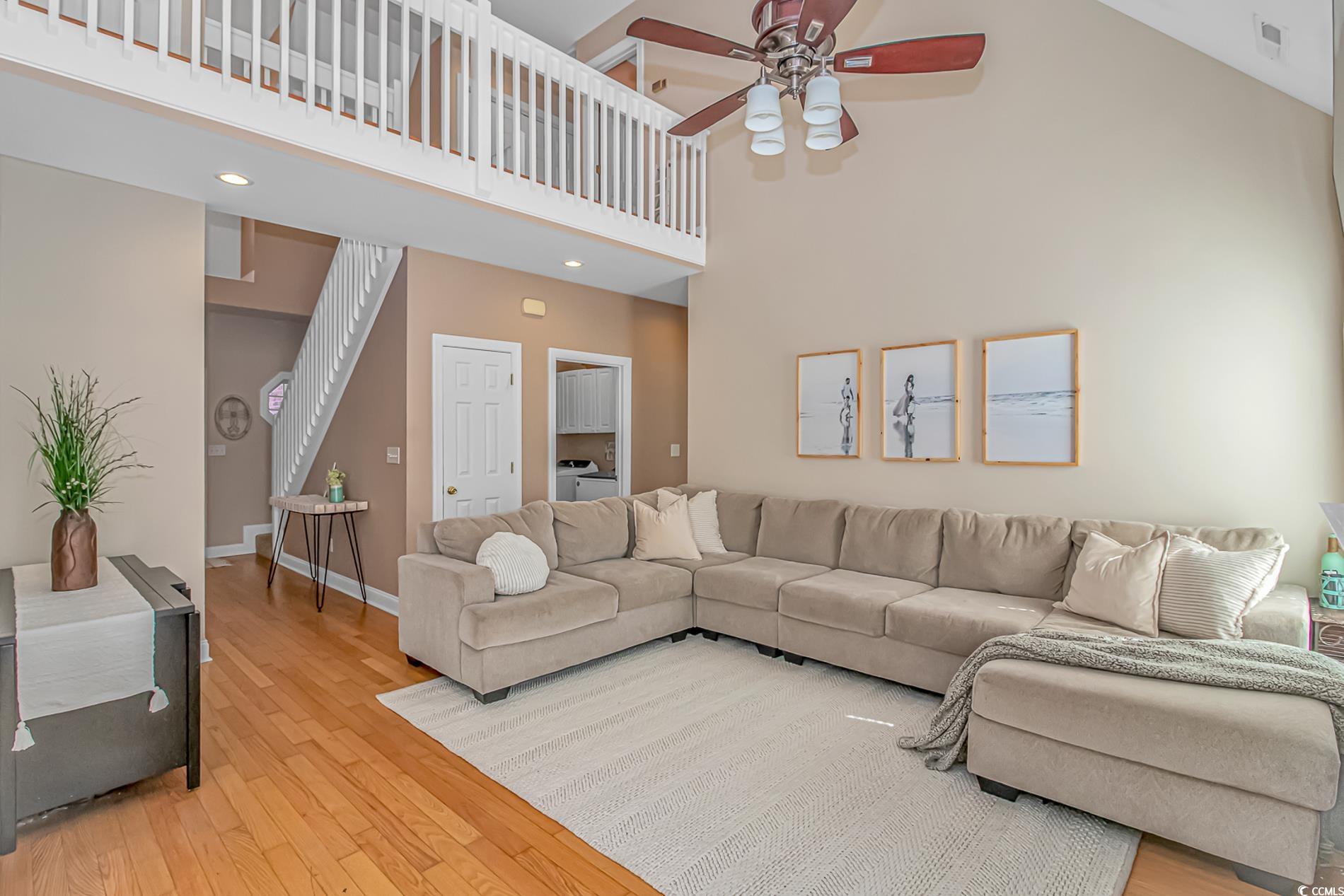 359 Rose Avenue Georgetown, SC 29440 - Photo 8 of 28 Foyer with a high ceiling, hardwood / wood-style f