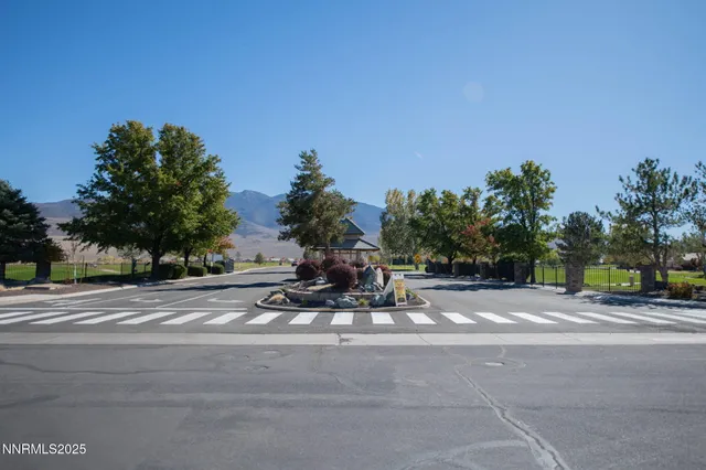 an aerial view of a house with a garden