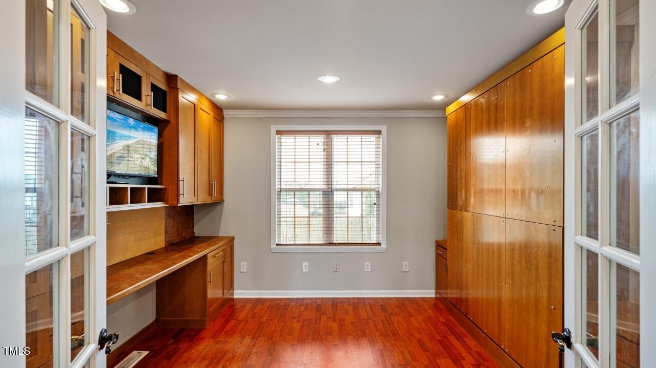 1065 Smith Road Smithfield, NC 27577 - Photo 18 of 36 a view of an entryway with wooden floor and a window