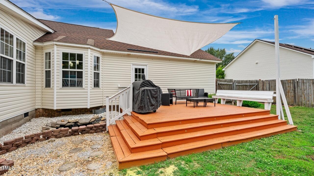 1065 Smith Road Smithfield, NC 27577 - Photo 31 of 36 a backyard of a house with barbeque oven