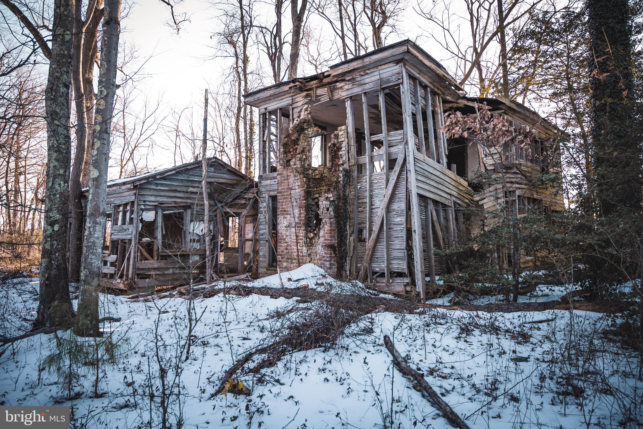 Tbd Sparta Road Milford, VA 22514 - Photo 33 of 48 a view of a house with a yard covered with snow