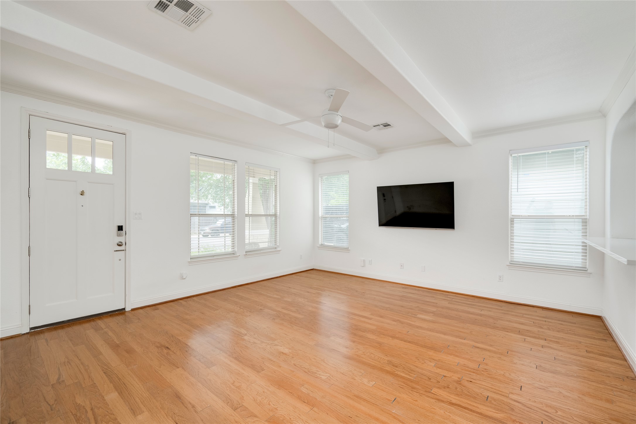 6008 Whipple Way Austin, TX 78745 - Photo 7 of 39 Hardwood floors and generous natural light create an inviting atmosphere.