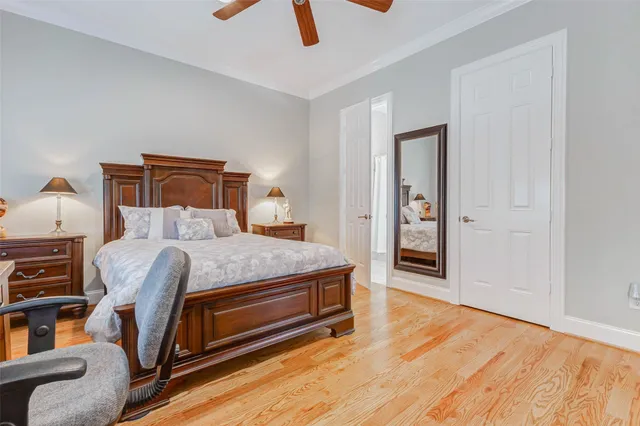 a bed room with a bed and a television