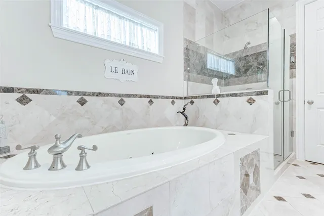 a bathroom with a sink and a bathtub