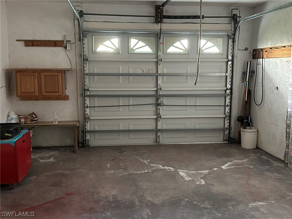 110 Florida Road Lehigh Acres, FL 33936 - Photo 8 of 10 a view of storage and utility room