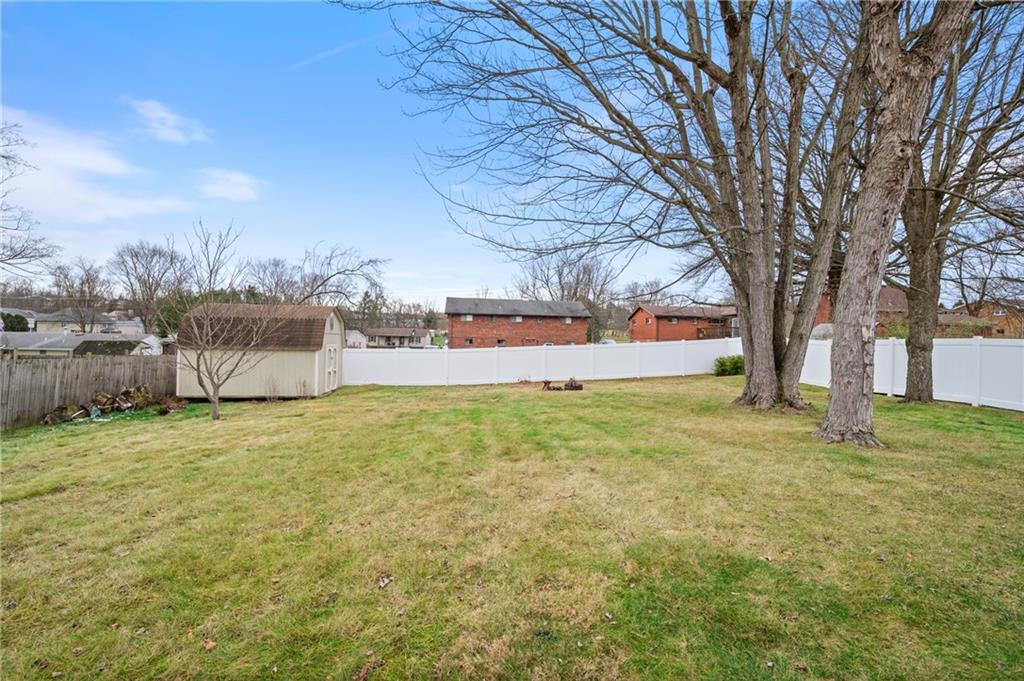 7 Dover Road Irwin, PA 15642 - Photo 25 of 31 a backyard of a house with lots of green space