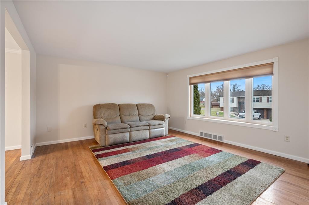 7 Dover Road Irwin, PA 15642 - Photo 4 of 31 a living room with furniture and a rug