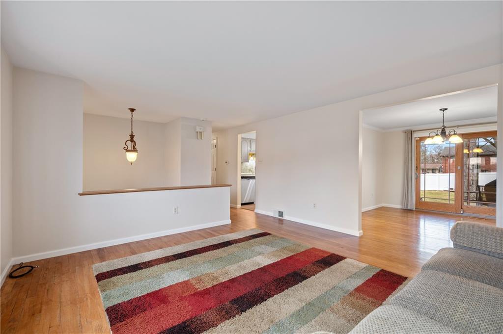 7 Dover Road Irwin, PA 15642 - Photo 5 of 31 a bedroom with a bed and a couch