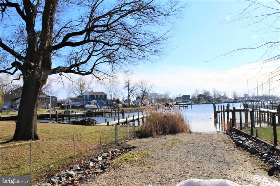 2211 Sparrows Point Road Baltimore, MD 21219 - Photo 26 of 28 a view of a lake with a trees
