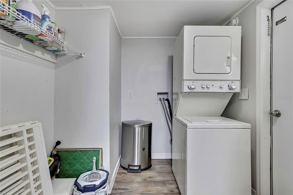 15739 Brenda Street Hudson, FL 34667 - Photo 28 of 50 a utility room with dryer and washer