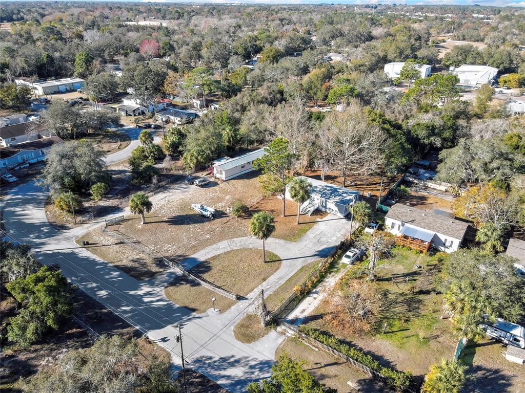 15739 Brenda Street Hudson, FL 34667 - Photo 30 of 50 an aerial view of residential houses with outdoor space