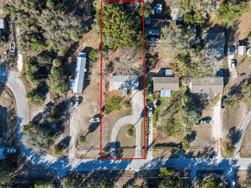 15739 Brenda Street Hudson, FL 34667 - Photo 3 of 50 an aerial view of a city