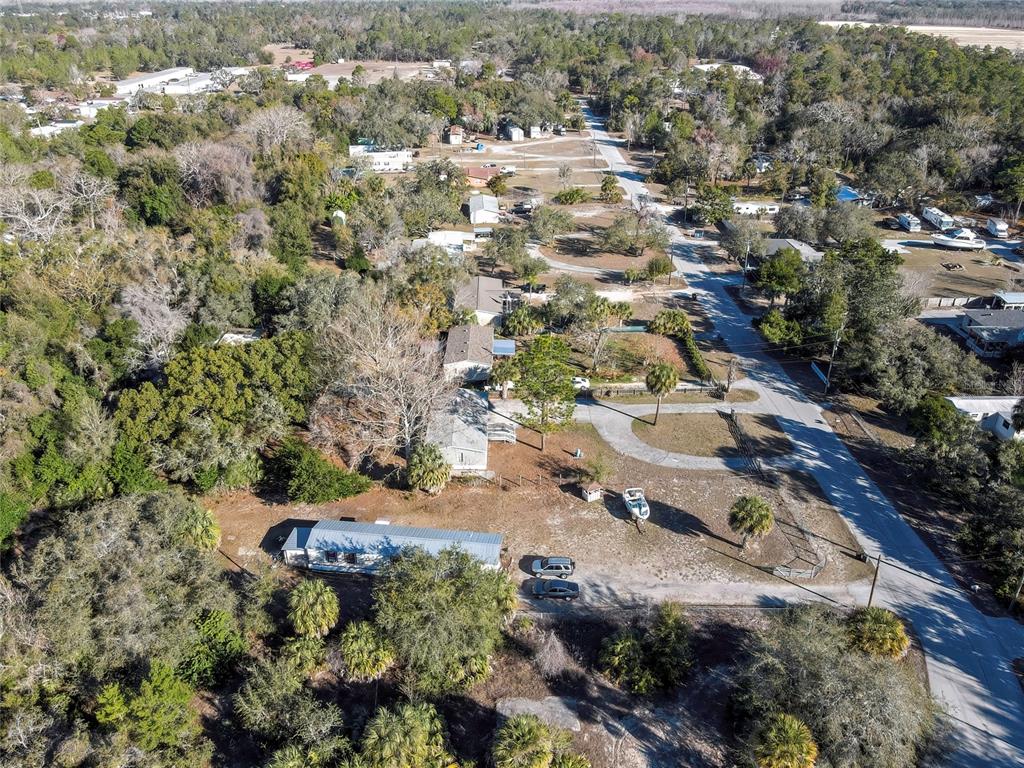 15739 Brenda Street Hudson, FL 34667 - Photo 35 of 50 an aerial view of a house with a yard