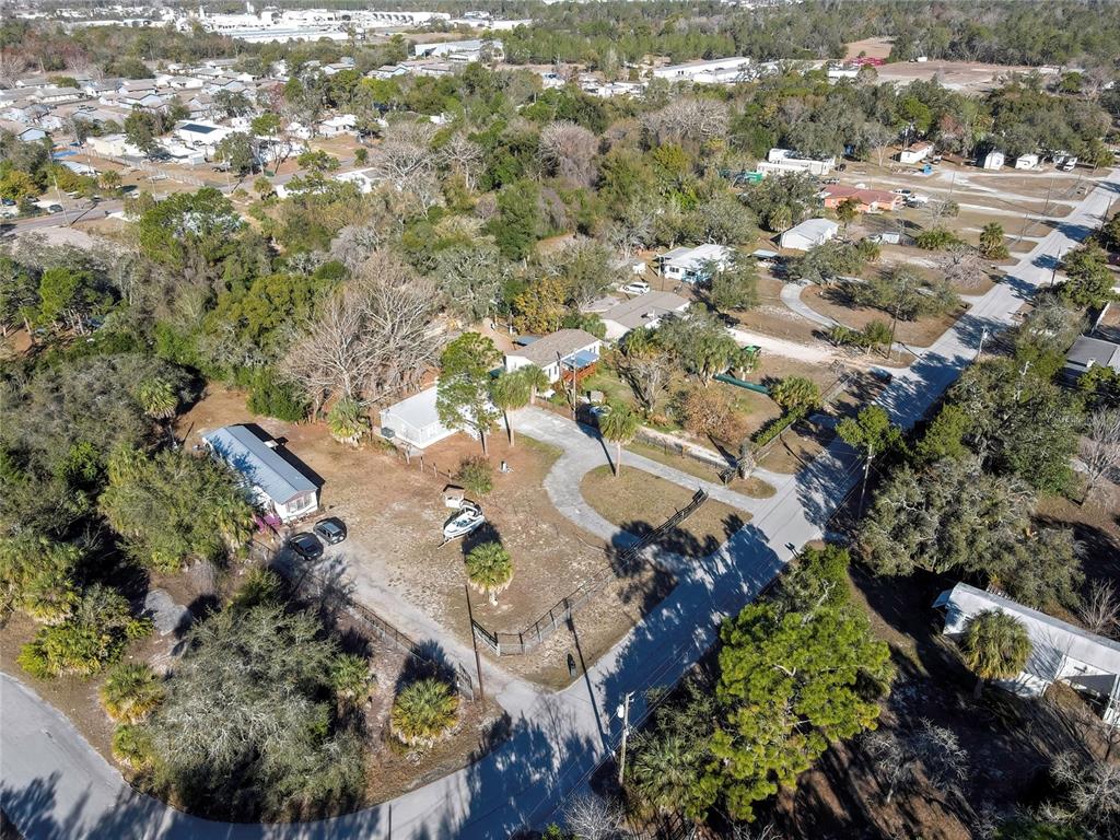 15739 Brenda Street Hudson, FL 34667 - Photo 36 of 50 an aerial view of residential houses with outdoor space