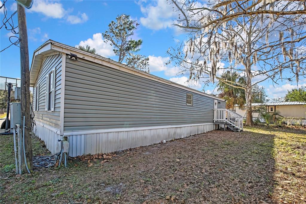 15739 Brenda Street Hudson, FL 34667 - Photo 41 of 50 a backyard of a house