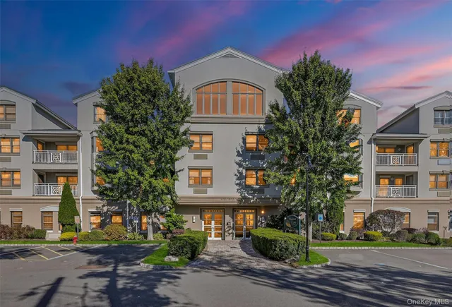 a front view of a multi story residential apartment building