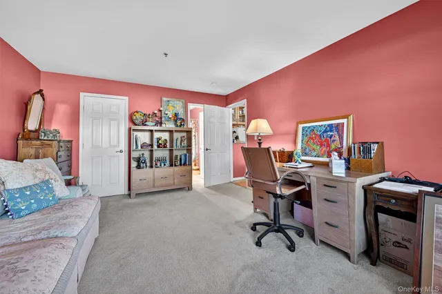 a view of a workspace with furniture