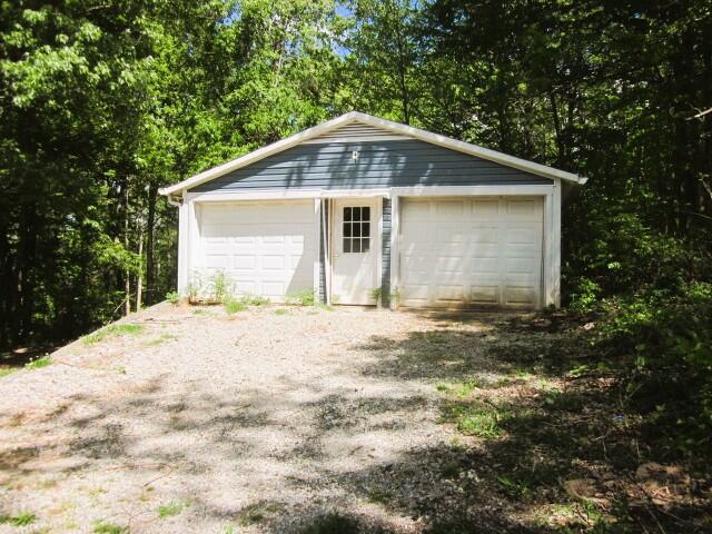 5574 Providence Church Road Ferrum, VA 24088 - Photo 5 of 17 a front view of house with yard and trees around
