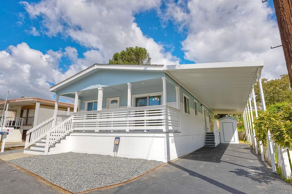 28890 Lilac Road Valley Center, CA 92082 - Photo 2 of 57 a view of a house with a yard and potted plants