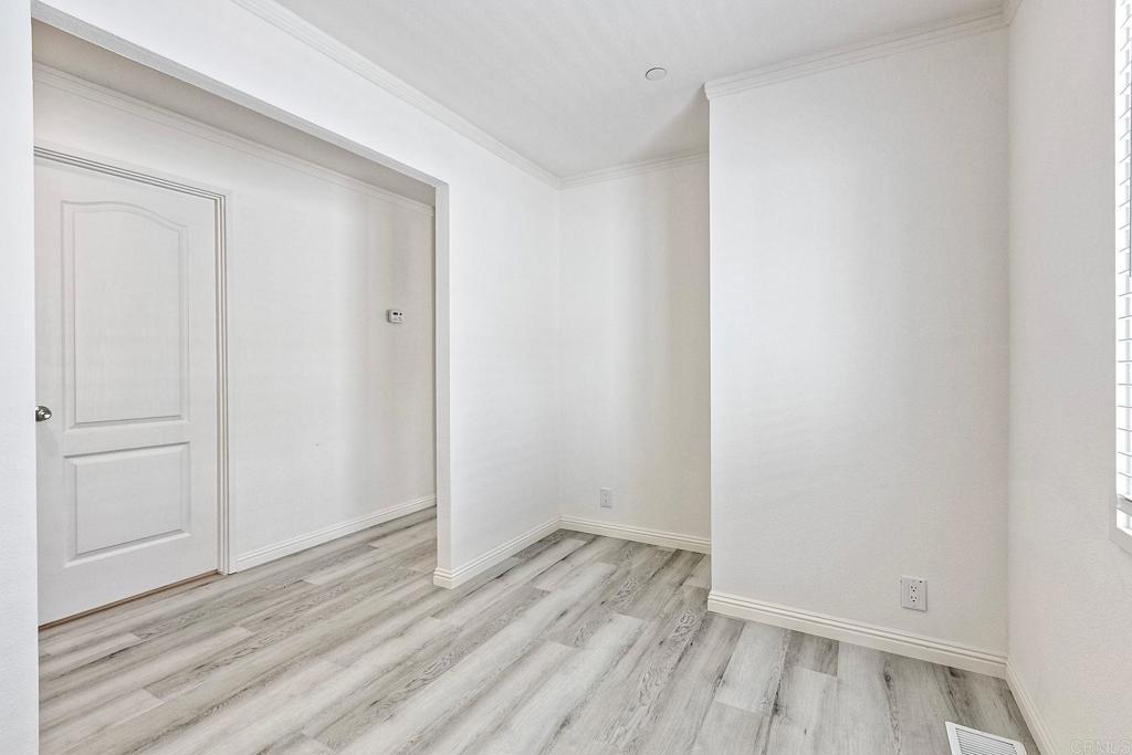 28890 Lilac Road Valley Center, CA 92082 - Photo 23 of 57 a view of a room with wooden floor