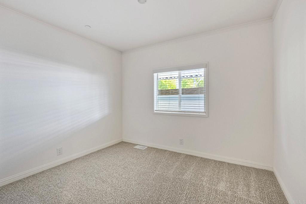28890 Lilac Road Valley Center, CA 92082 - Photo 24 of 57 an empty room with a window