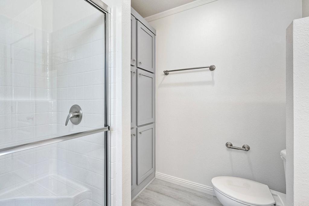 28890 Lilac Road Valley Center, CA 92082 - Photo 30 of 57 a bathroom with a toilet and a shower