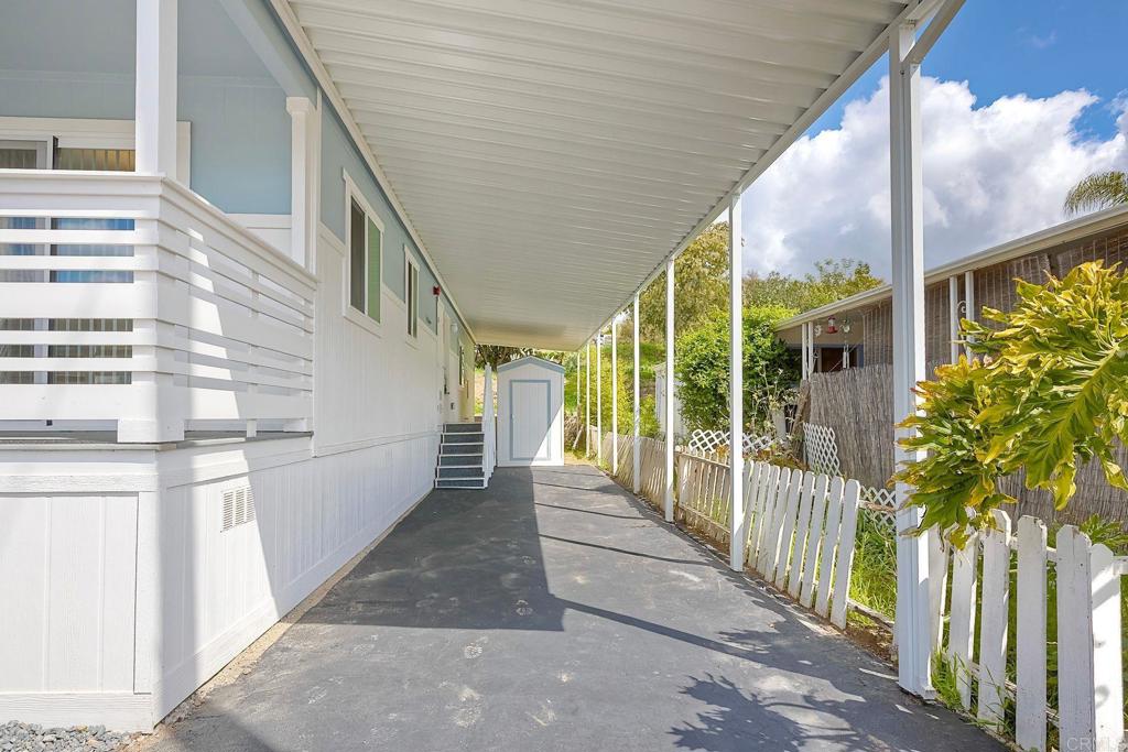 28890 Lilac Road Valley Center, CA 92082 - Photo 3 of 57 a view of a house with a porch