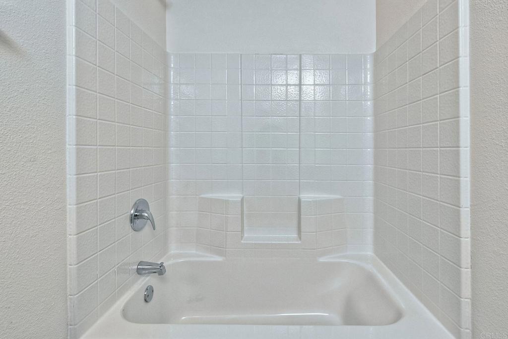 28890 Lilac Road Valley Center, CA 92082 - Photo 32 of 57 a close up of a bathtub in a bathroom