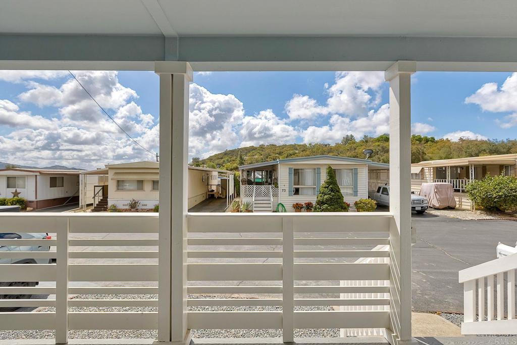 28890 Lilac Road Valley Center, CA 92082 - Photo 33 of 57 a view of a brick house with a large window and front door