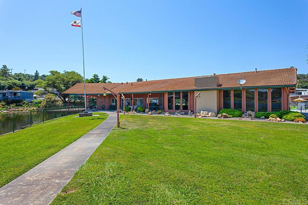 28890 Lilac Road Valley Center, CA 92082 - Photo 38 of 57 a view of a house with a yard table and chairs