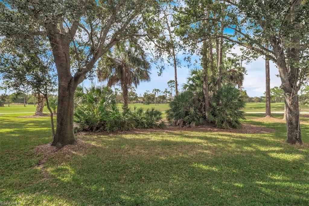8075 Tiger Cove, Unit 1706 Naples, FL 34113 - Photo 37 of 50 View of golf course