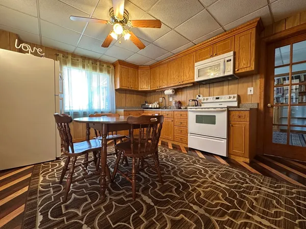 a view of a dining room with furniture