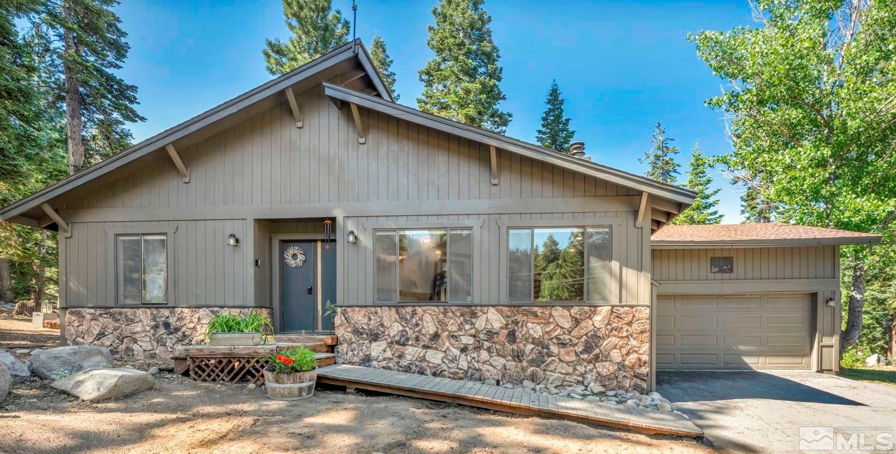 445 Andria Drive Stateline, NV 89449 - Photo 1 of 36 a front view of a house with garden